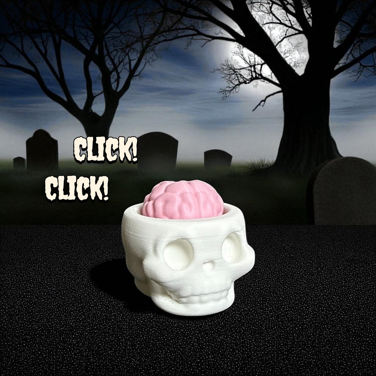 3D printed Skull Fidget Clicker with pink brain topper – spooky Halloween stress relief toy handmade by The Print Forge