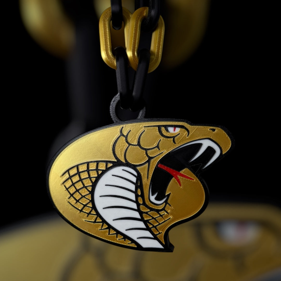 3D printed Hudson High School Cobra Swag Chain – oversized custom school mascot necklace for sports fans and students